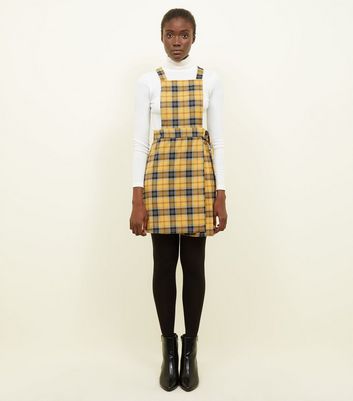 black overall skirt yellow check