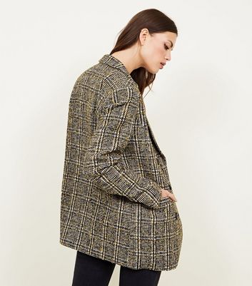 mustard boucle coat