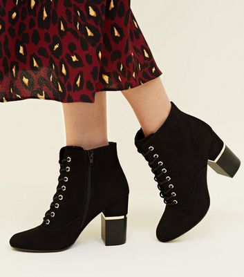 Black and gold store lace up boots