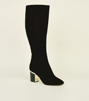 black knee high boots with gold trim