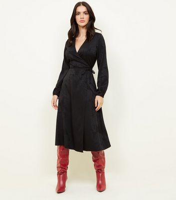 black dress with long boots