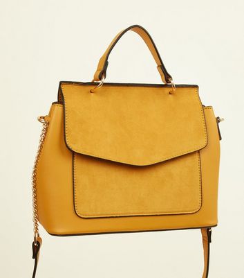 new look mustard clutch bag