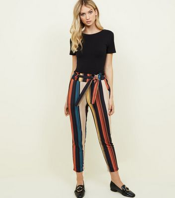 multicoloured striped trousers