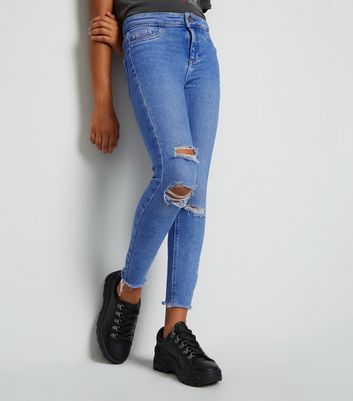 black trainers with jeans