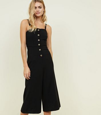 black jumpsuit with buttons