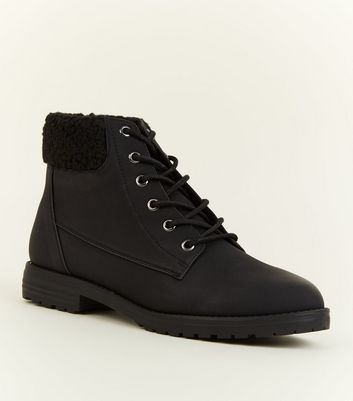 black flat lace up boots