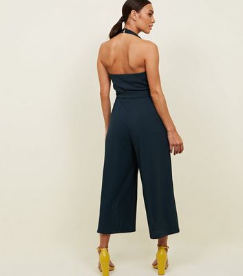 green halter neck jumpsuit