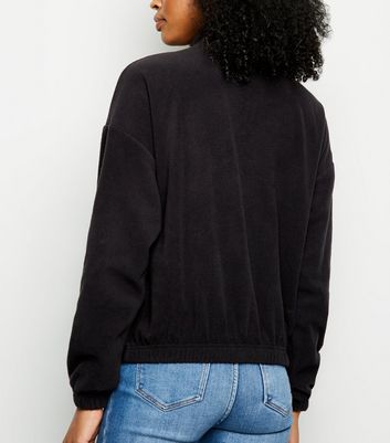 black fleece jumper