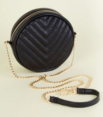 black round cross body bag