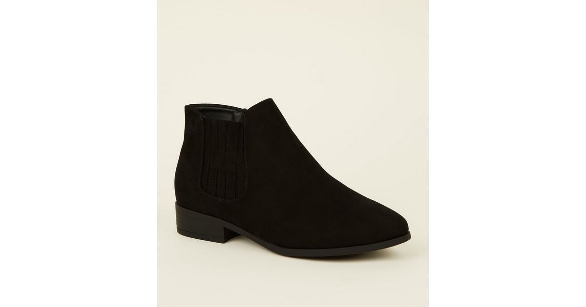 black suede flat chelsea boots
