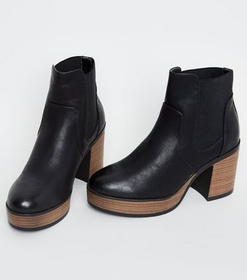 black leather booties wooden heel