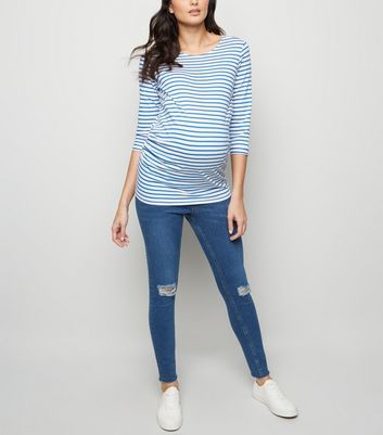 under bump skinny jeans