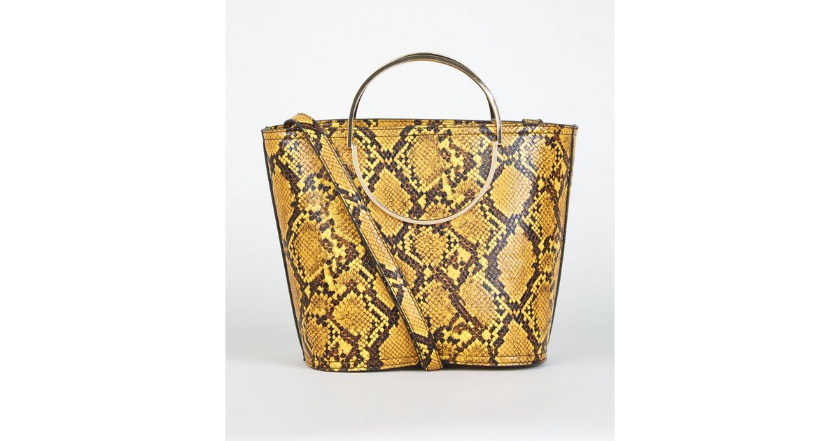 Yellow Faux Snake Ring Handle Bucket Bag New Look