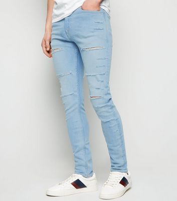 ripped bleach wash skinny jeans