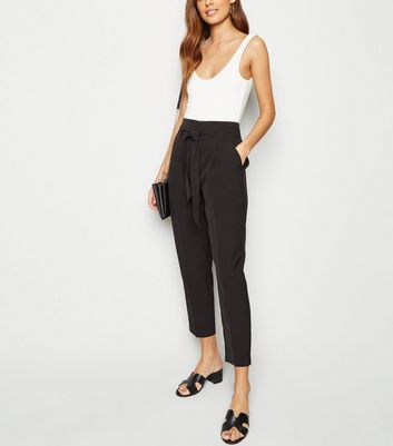 high waisted black tapered trousers