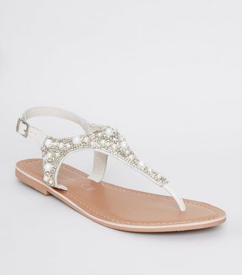 white beaded sandals