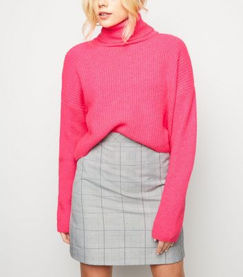 bright pink polo neck jumper