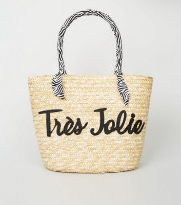 Stone Woven Straw Effect Tres Jolie Slogan Tote Bag New Look