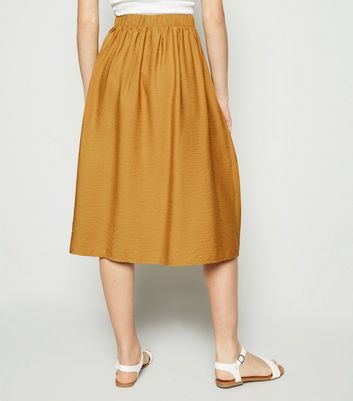 mustard aline skirt