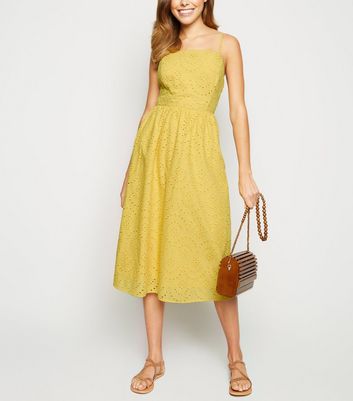 yellow strappy dress