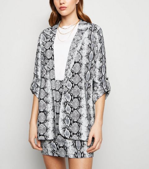 Blazer blanc à imprimé effet peau de serpent