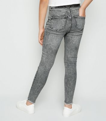 grey ripped jeans girls