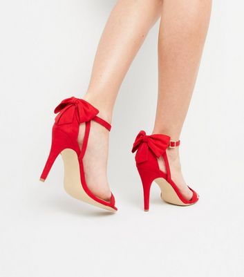 red heels with bow on back