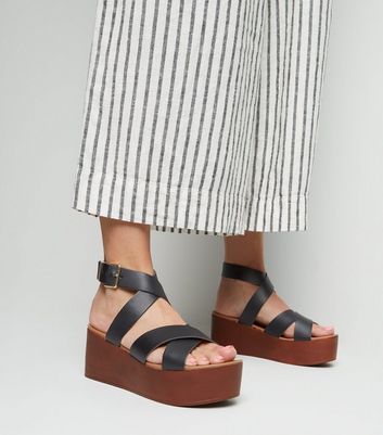 black strappy flatforms