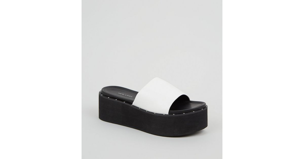 white leather slider