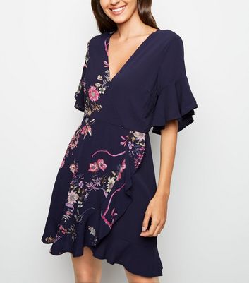 navy floral cut in neck wrap dress