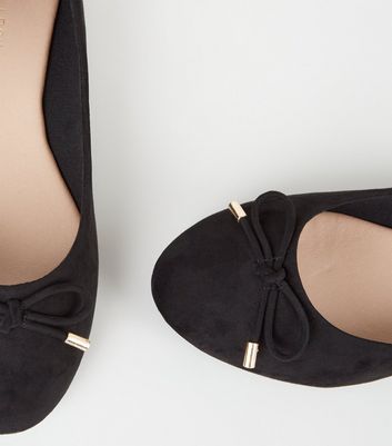 pumps with bows on front