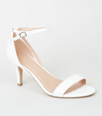 white wide heel shoes