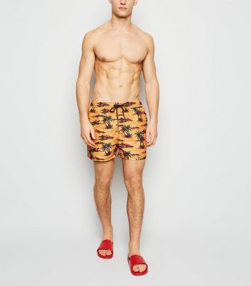 mustard yellow swim trunks