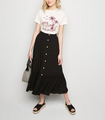 black button skirt outfit