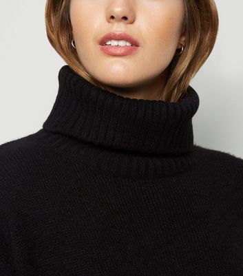 black batwing polo neck jumper