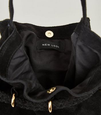 black suede tassel bag