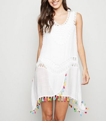 white pom pom dress
