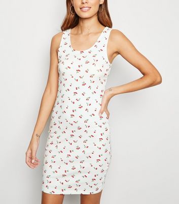 white dress with cherry print