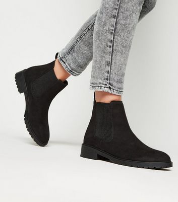 black cleated chelsea boots