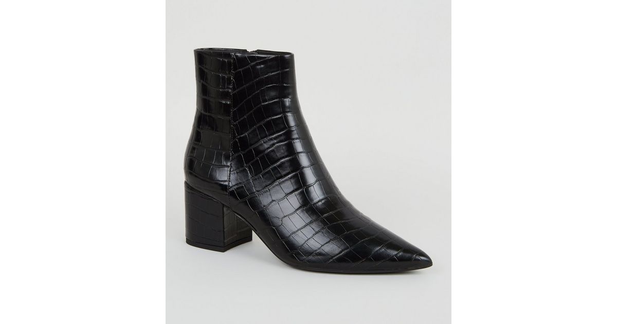 pointed croc boots