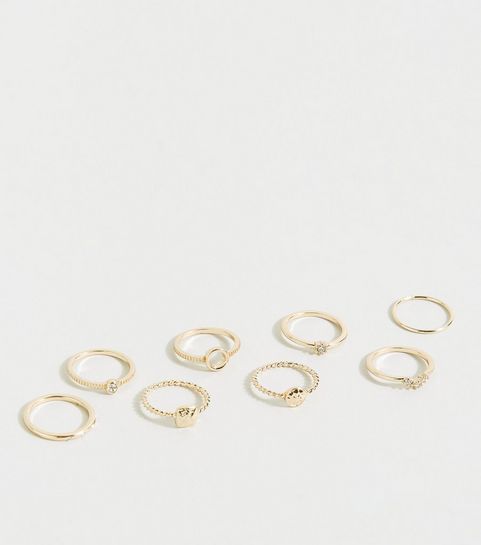 Goldfarbene, gehämmerte Steckringe mit Strass, 8er-Pack