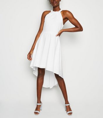 white dip hem dress