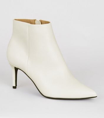 white pointed boots