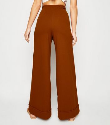 rust wide leg trousers