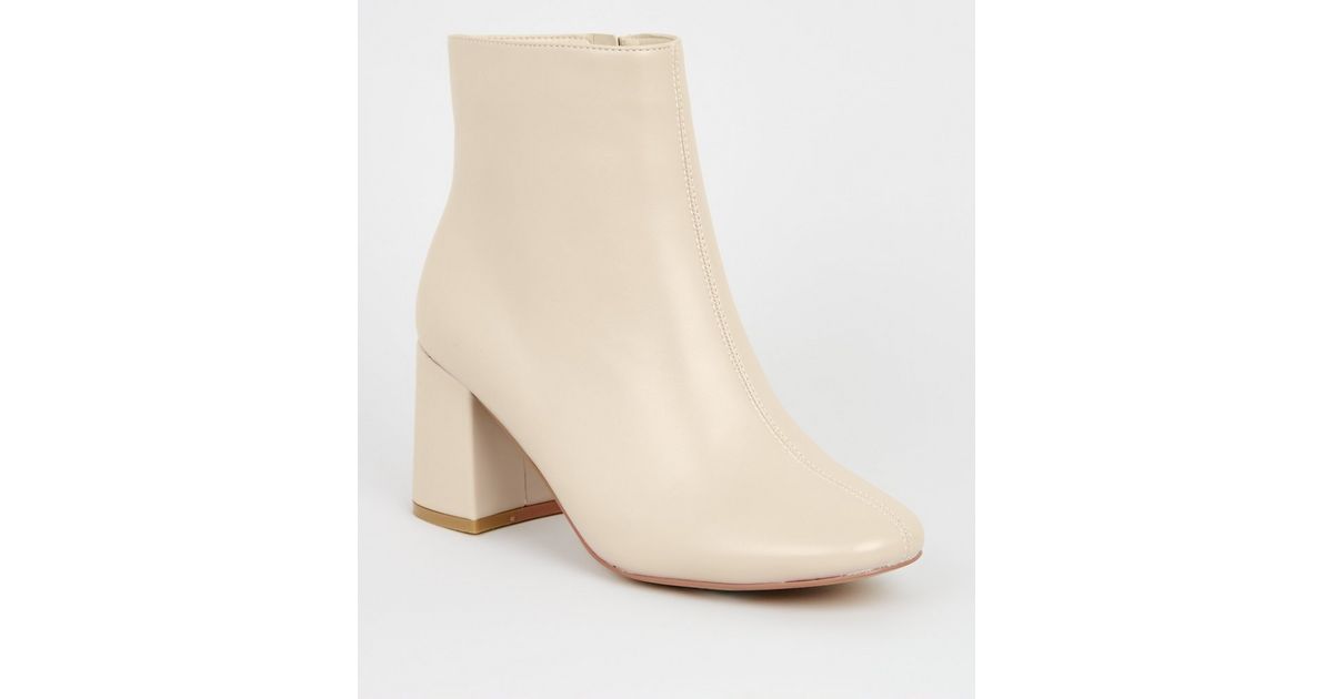 Wide Fit Cream Flared Heel Ankle Boots New Look