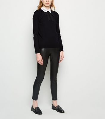 black jumper with bow