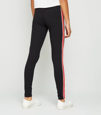 black leggings with yellow stripe down the side