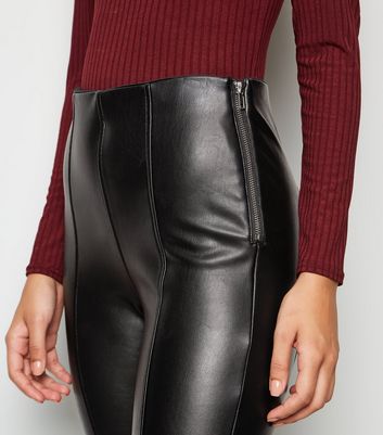New Look faux leather slim leg trousers with split front in black  ASOS