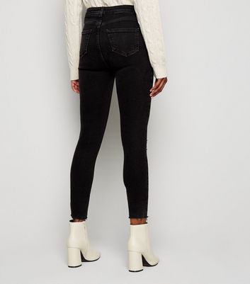 womens black raw hem jeans