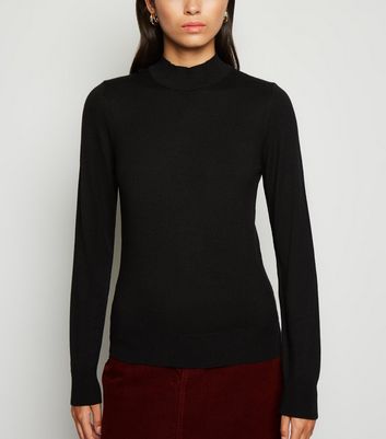 black jumper high neck